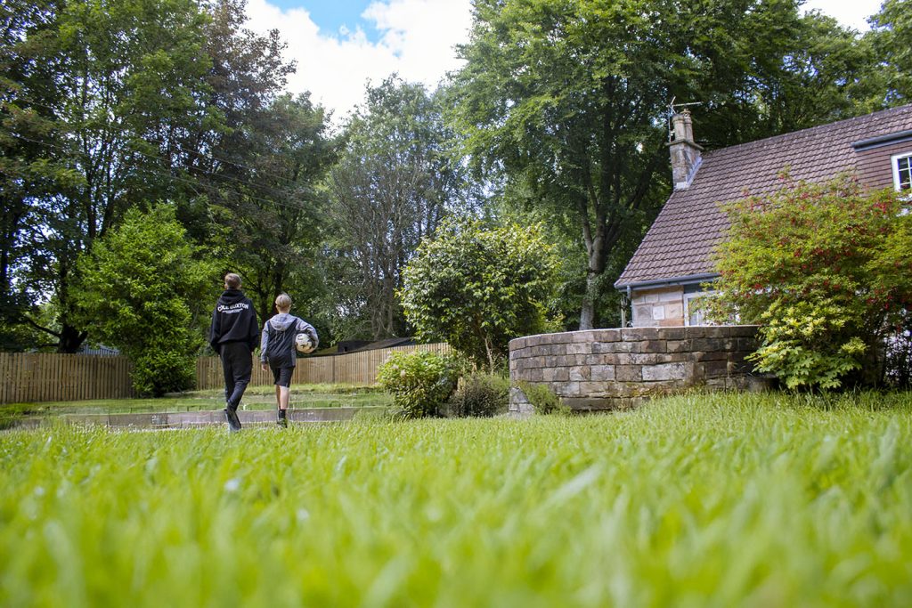 The boys headed back into house from the garden with a football